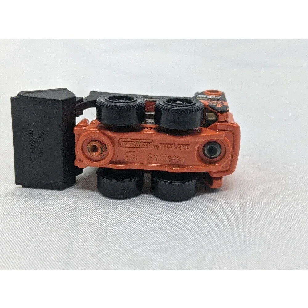 2009 Orange Matchbox Skidster Toy Mover Truck
